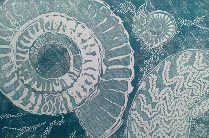 Linocut print of ammonites